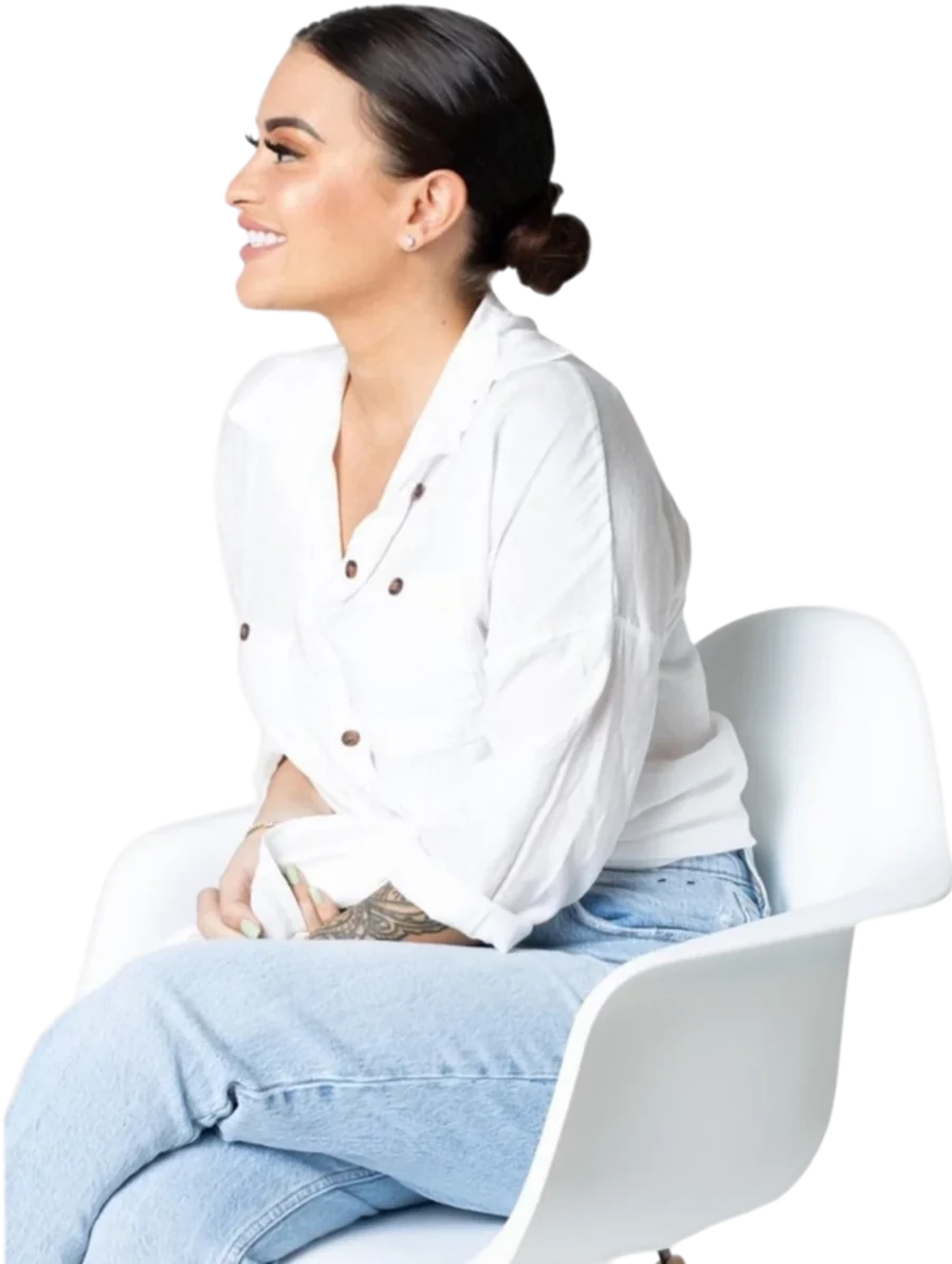 Erica Battista, LCSW, PMH-C, seated and smiling